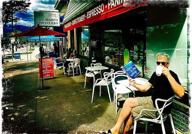 Michael reading at a Vancouver cafe